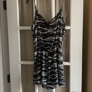 Lush black and white romper, size large.